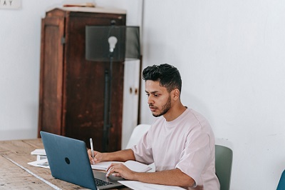 Applicant for Forum Family Office writing a test for a job application